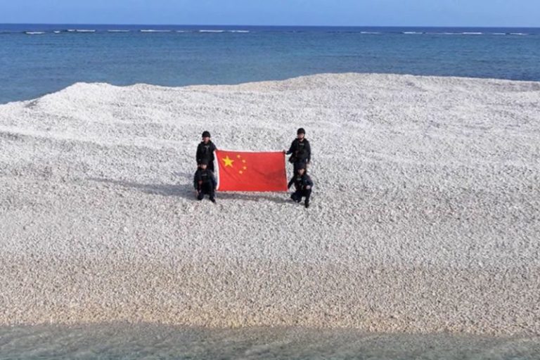China and Philippines unfurl competing flags on disputed South China Sea sandbars, reviving tensions